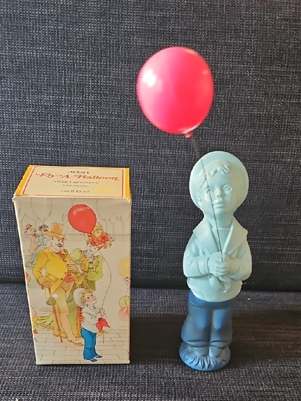 Avon Fly A Balloon Blue Boy Figurine with Pink Balloon